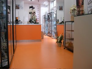 Oranje gietvloer epoxy winkel